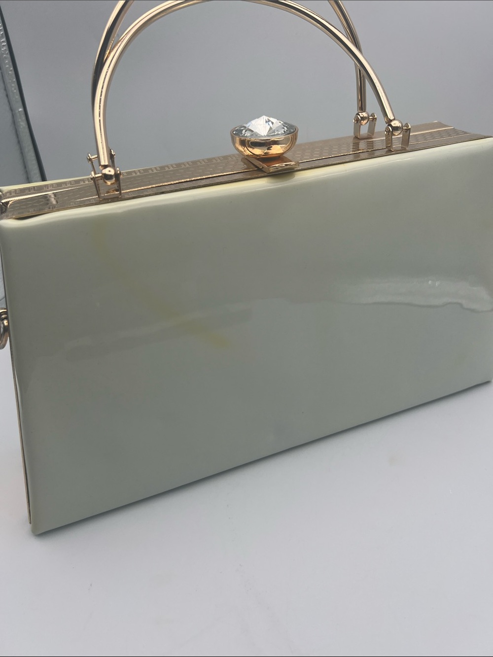 Elegant Cream Box Clutch with Gold Hardware